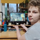 115389